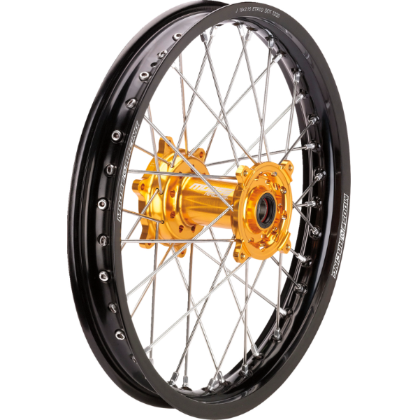 Motorcycle wheel with gold hub on a white background